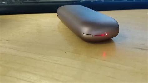 iqos lights blinking red.